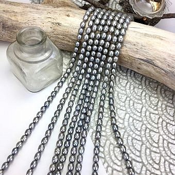 6.5x7.5mm Dyed Greyish Green Rice Freshwater Pearls Beads