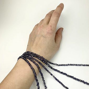 Alternative view of 4x5.5mm Irregular Micro Faceted Saucer Iolite Rondelle Beads