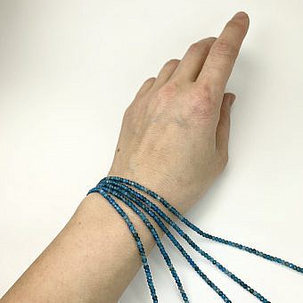 Alternative view of 2x3mm Micro Faceted Rondelle Blue Apatite Beads