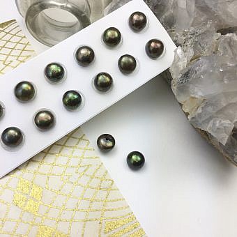 dyed green paired pearls