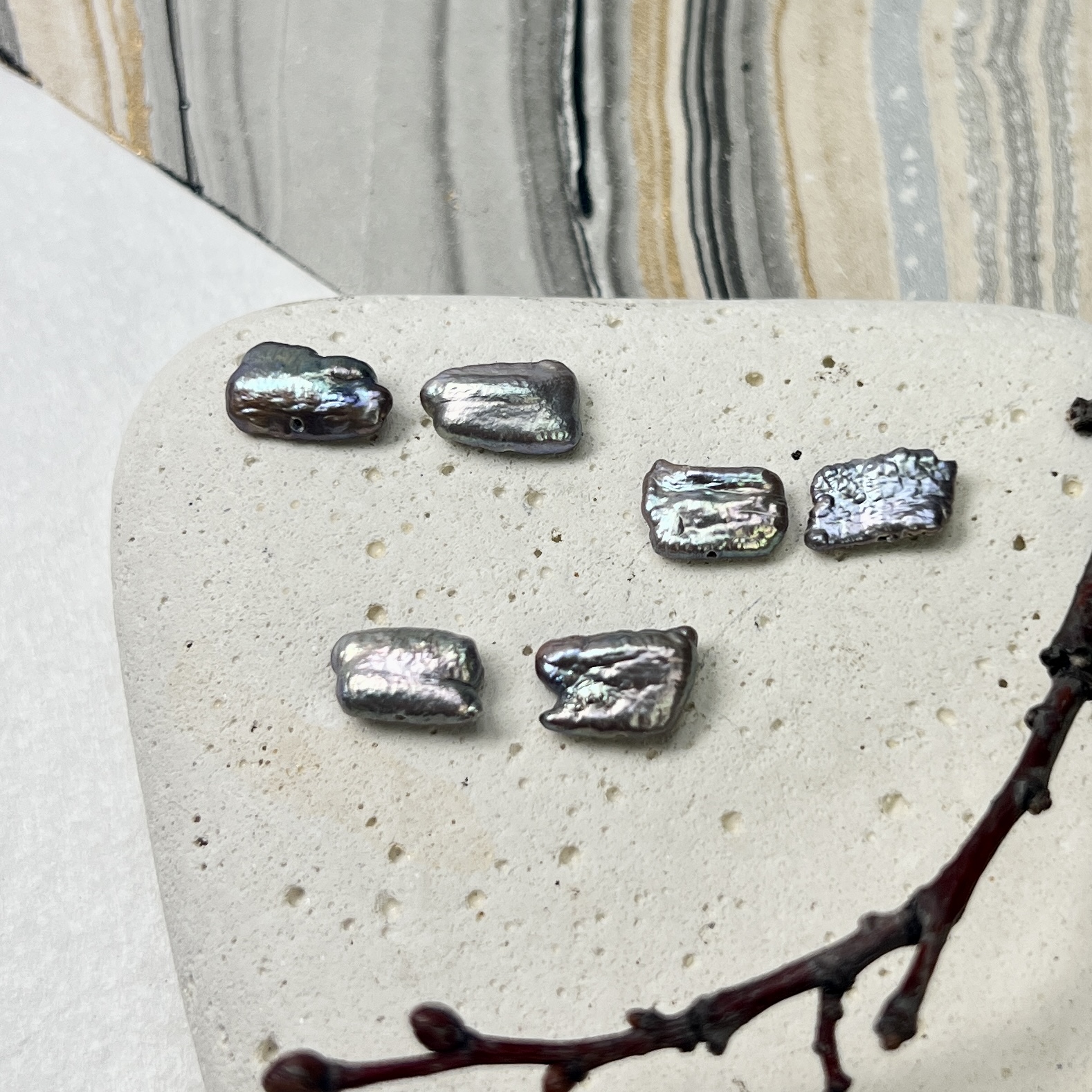 grey biwa paired pearls