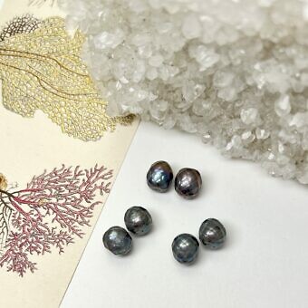 paired faceted peacock pearls