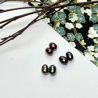 peacock paired rice pearls