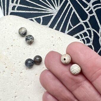 Alternative view of 6mm Smooth Round Silver Leaf Jasper Paired Beads