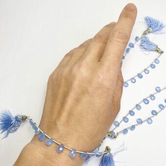 Alternative view of 5x7mm Micro Faceted Teardrop Light Sky Blue Chalcedony Beads