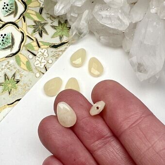 Alternative view of 10x7mm Faceted Teardrop Pear Dyed Yellow Jade Paired Beads