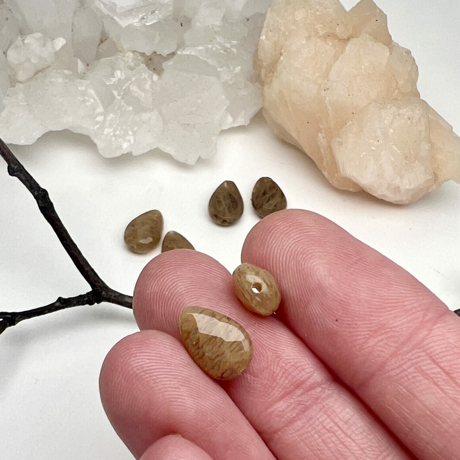 10x7mm Faceted Teardrop Pear Man Made Rutilated Quartz Paired Beads - Image 2