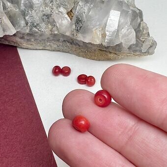Alternative view of 6x4mm Dyed Red Bamboo Coral Paired Faceted Rondelle Center Drilled Beads