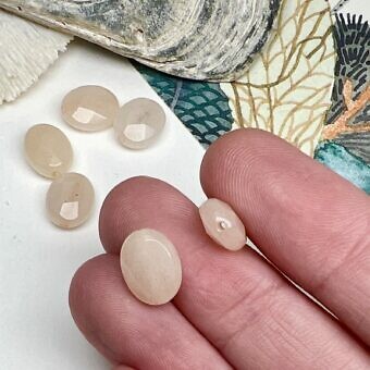 Alternative view of 10x8mm Faceted Oval Dyed Peach Jade Paired Beads