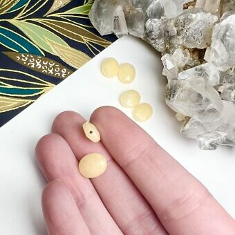 Alternative view of 10x8mm Faceted Oval Dyed Yellow Jade Paired Beads