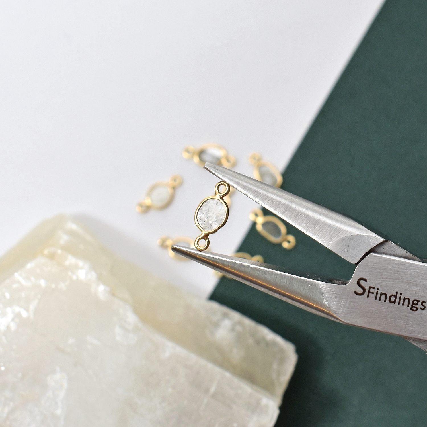 Small Freeform Natural Grey Diamond Slices Bezel in Solid 14kt Gold Connector Hold By A Pair of Precision Pliers