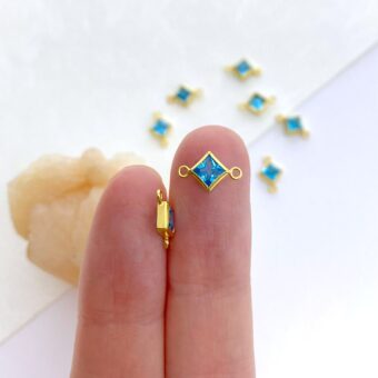 foa27g-4mm-bright-blue-diamond-bezel-set-cz-crystal-14kt-gold-filled-birthstones-connector-pendant-charm-december-hand