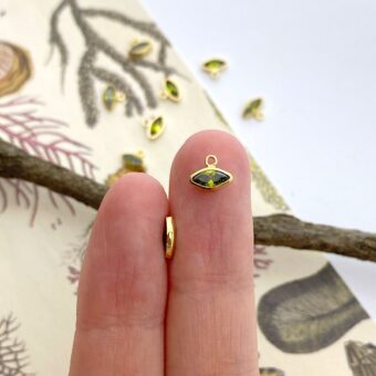 fhq8g-light-green-evil-eye-bezel-set-cz-crystals-14kt-gold-filled-birthstones-pendants-charms-august-hand