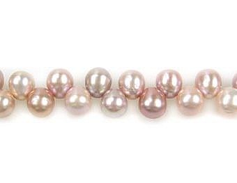 Alternative view of 6x7mm Pink Tulle Rice Freshwater Pearls Beads