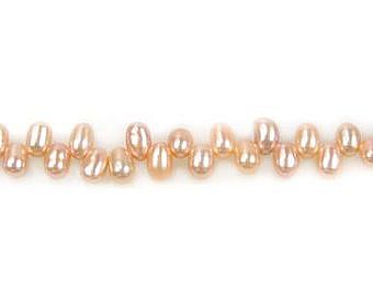 Alternative view of 4x5mm Pink Tulle Rice Freshwater Pearls Beads
